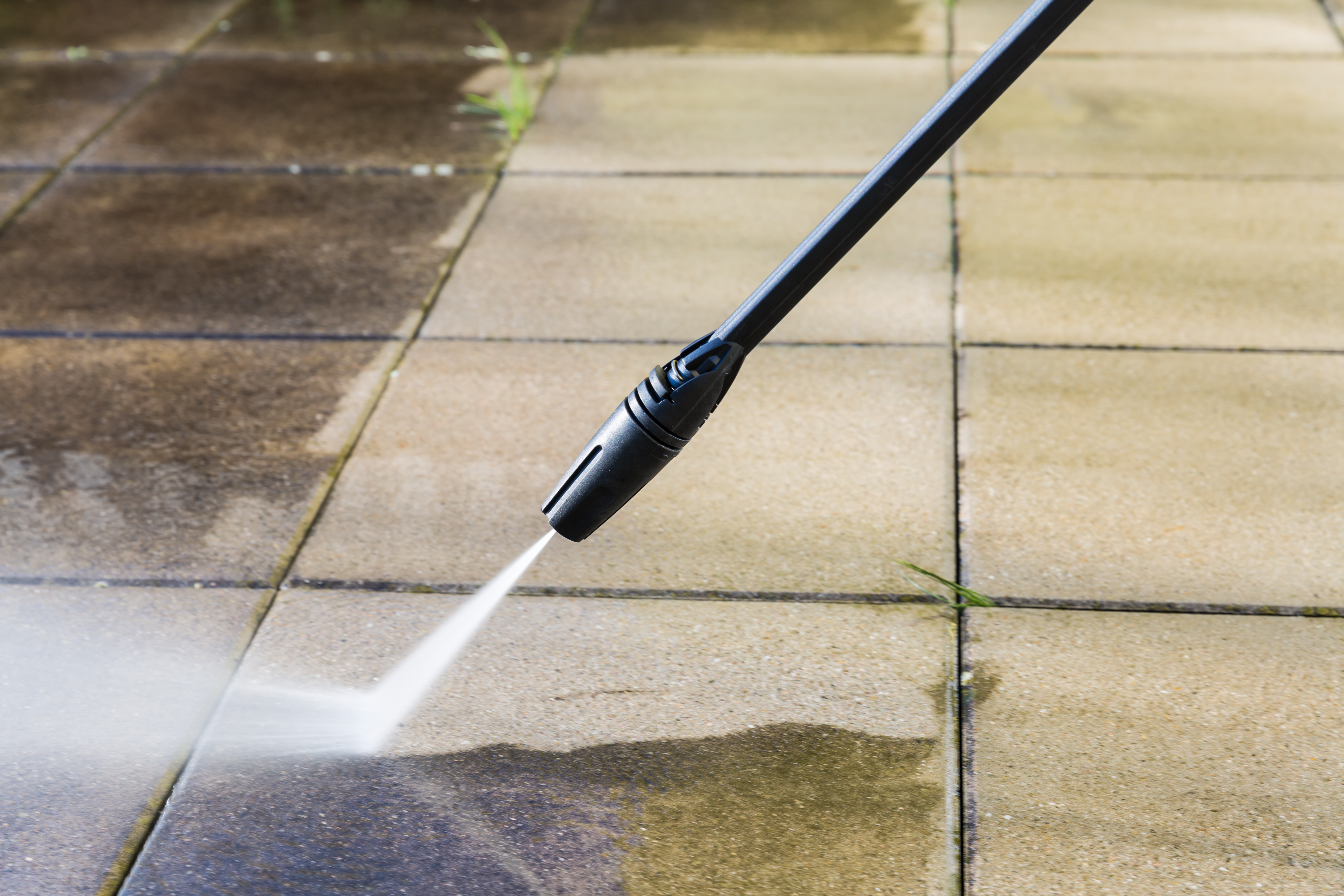 Detail of cleaning terrace with pressure washing